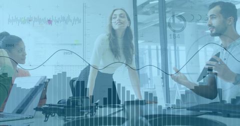 Collaborative Team Meeting Amid Financial Data Graphics