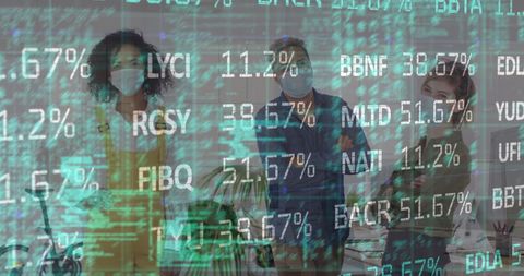 Diverse Business Colleagues Analyzing Stock Market Data in Office