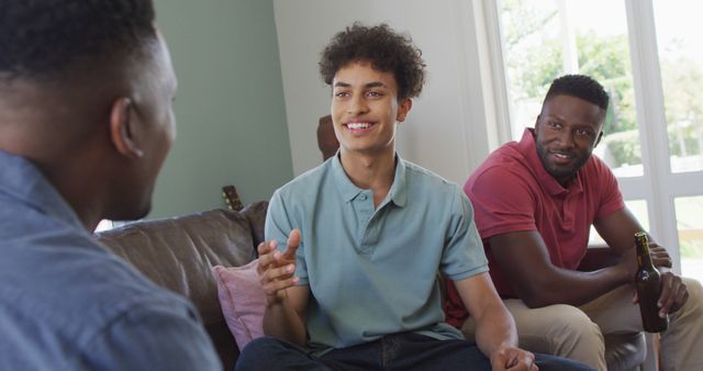 Group of Friends Engaging in Friendly Conversation at Home - Download Free Stock Images Pikwizard.com