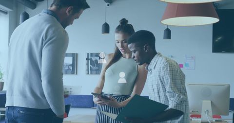 Diverse Business Team Collaborating with Digital Technology in Modern Office