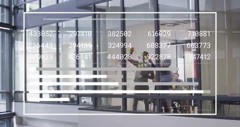 Team Collaborates in Modern Office with Digital Data Overlay