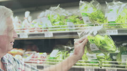Senior Man Shopping in Grocery Aisle Overlaid with Data Graphics