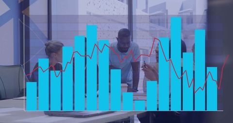 Diverse Business Team Reviewing Performance Chart in Modern Office