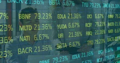 Finance team analyzing stock market data on tablet