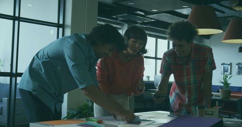 Vibrant Team Brainstorming in Modern Office Lounge