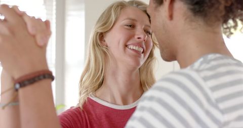 Joyful Diverse Couple Dancing at Home in Relaxed Atmosphere - Download Free Stock Images Pikwizard.com