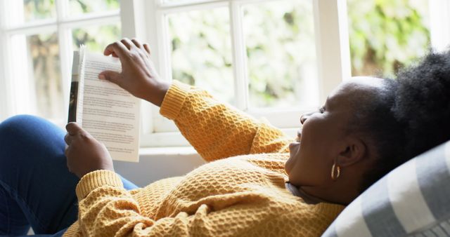 African American Woman Relaxing and Reading Book at Home - Download Free Stock Images Pikwizard.com