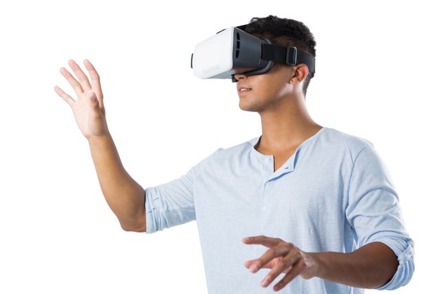 Man wearing VR headset, engaging with virtual environment. Ideal for technology, gaming, and innovation concepts. Useful for illustrating modern digital experiences and immersive technology in marketing materials, blogs, and educational content.