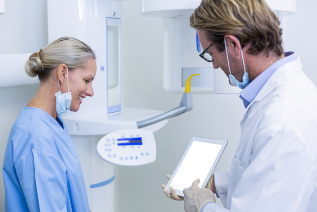 Dentists Using Digital Technology for Patient Care in Dental Clinic - Download Free Stock Videos Pikwizard.com