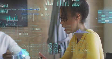 biracial businesswoman analyzing digital data in office environment - Download Free Stock Images Pikwizard.com