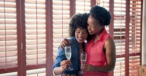 Joyful celebration with champagne at home