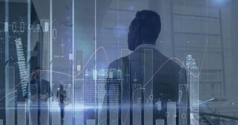 Financial Analyst Monitoring Data Trends in Modern Office