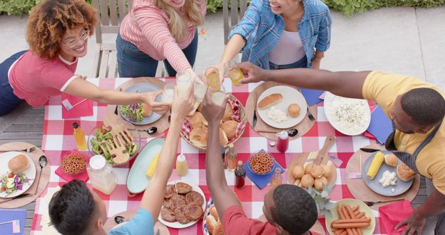 Diverse Friends Enjoying Outdoor Picnic with Food and Drinks - Download Free Stock Images Pikwizard.com