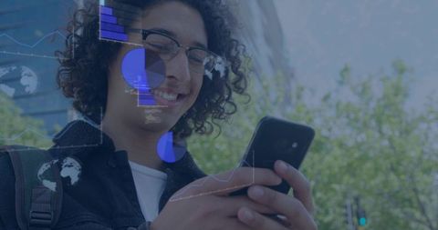 Young man checking smartphone with blue data overlay on urban street for mobile tech