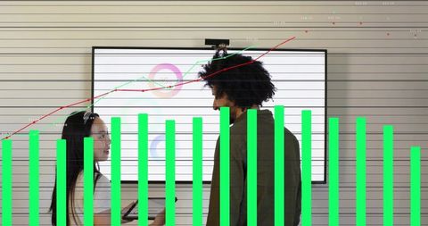 Business team presenting wall display with tablet and data visualization overlays