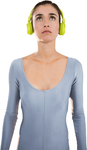 Woman in Sportswear with Lime Green Headphones Looking Up Transparent