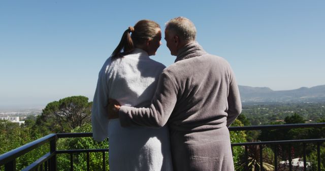 Senior Couple Embracing on Scenic Balcony - Download Free Stock Images Pikwizard.com