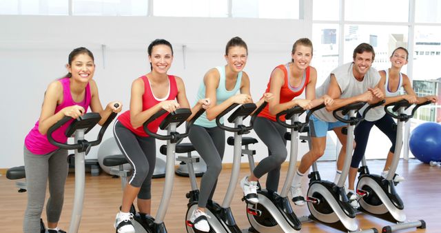 Spinning class in fitness studio at the gym