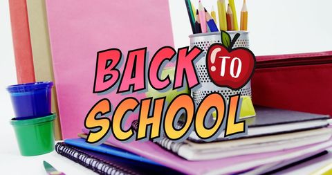 Back to school supplies with colorful notebooks and pencils