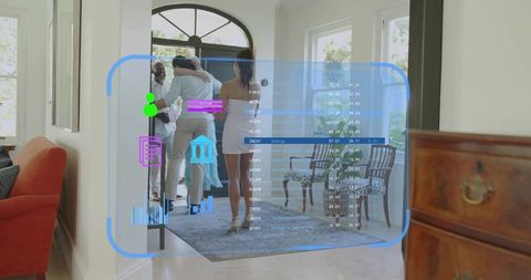 Family greeting and hugging at modern home entry with augmented reality hud overlay
