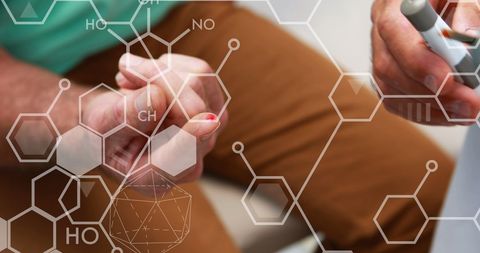 Patient Using Glucose Meter with Chemistry Formulas Overlay