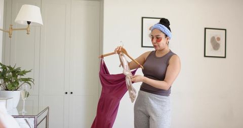 Choosing maroon dress and nude heels for date night while wearing under-eye patches