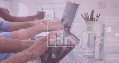 Business Team Analyzing Data on Digital Devices with Graph Overlay - Download Free Stock Images Pikwizard.com