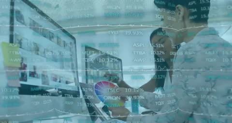 Designer Analyzing Color Wheel with Fluctuating Finance Data Overlay