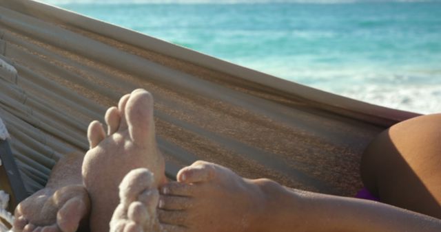 Relaxing in Hammock by Ocean, Feet in Summer Sand - Download Free Stock Images Pikwizard.com