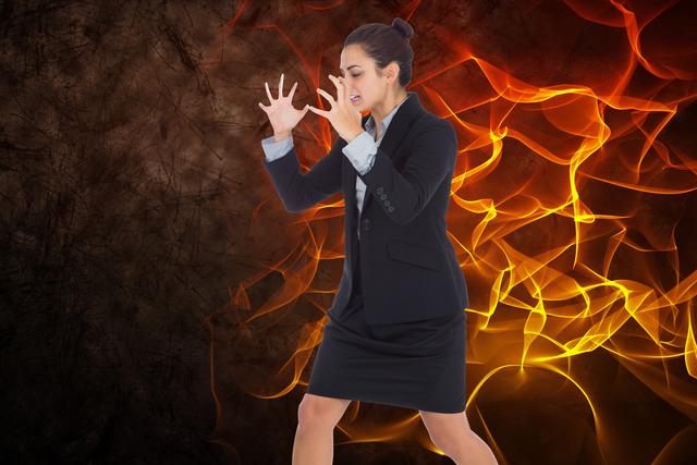 Angry Businesswoman in Suit Screaming with Fiery Background - Download Free Stock Photos Pikwizard.com