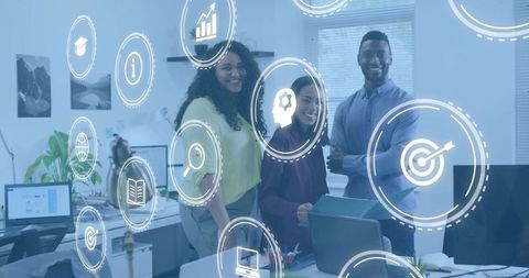 Diverse team collaborating in modern office with digital hud graphics