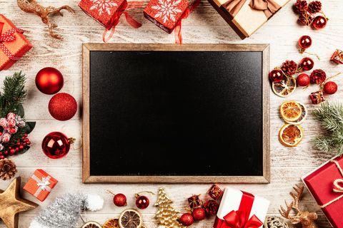Festive christmas chalkboard with gifts and ornaments