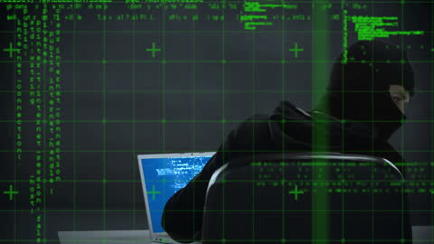 This video depicts a caucasian male engaged in hacking activity, illustrating the modern threat of cybercrime. The backdrop suggests a digital space with interconnected data. Useful for articles or presentations on cybersecurity, digital theft, or technology-centered topics related to data protection and online security.