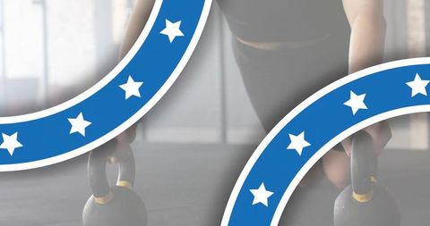 Gripping kettlebells holding plank with blue star ribbon graphic for strength training