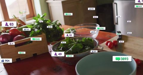 Fresh organic vegetables with digital reactions in modern kitchen