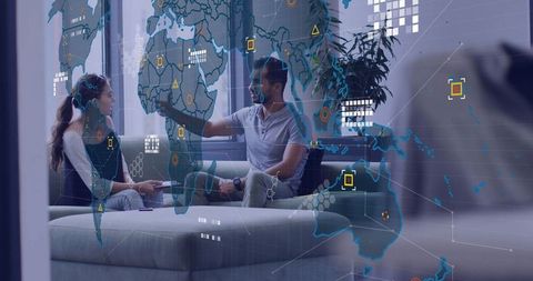 Colleagues Discussing Data with Holographic World Map Overlay