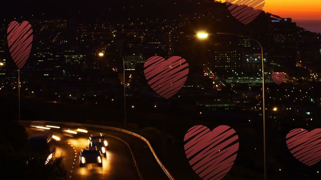 Video showing red hearts falling over a bustling night cityscape with moving traffic. Ideal for conveying themes of love, urban romance, local commitment, and city life. Good for campaigns focused on promoting a city, urban life, or public events.