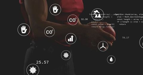 Athlete gripping red ball with augmented data overlays and analytics on dark background