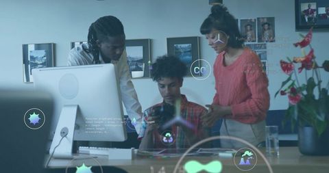 Collaborative Tech Team Working with Holographic Interface in Modern Office