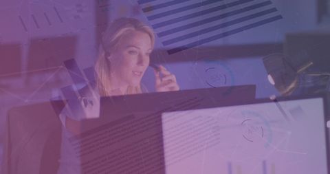 Caucasian Businesswoman Analyzing Financial Data with Digital Overlay