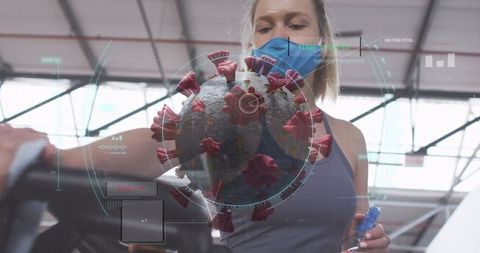 Woman Disinfecting Gym Equipment with Covid-19 Cell Overlay