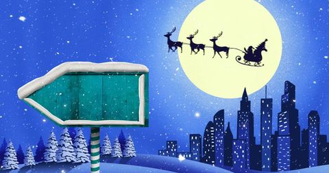 Santa Claus Flying Over Winter Cityscape at Night