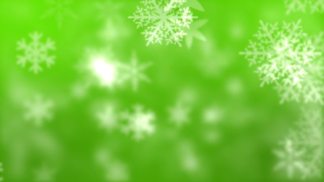 Snowflakes appear over vibrant green backdrop, creating a stylish blend of nature and winter themes. Suitable for holiday greeting cards, winter promotions, or design backgrounds envisioning holidays uniquely.