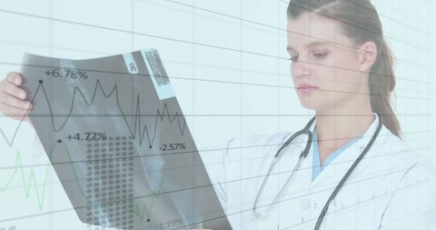 Female Doctor Analyzing Medical Data Chart in Hospital - Download Free Stock Images Pikwizard.com