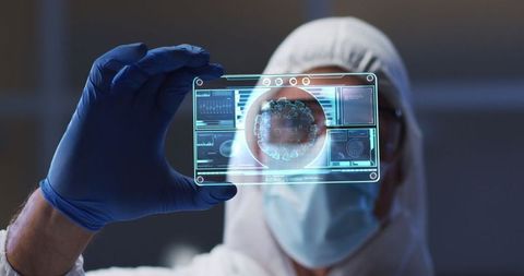Scientist analyzing digital holographic medical data screen