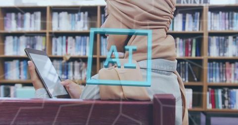 Studying with ai on tablet by muslim woman wearing hijab in library, elearning concept