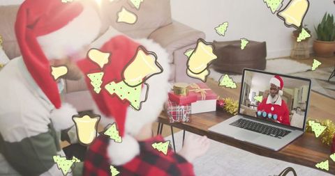 Christmas virtual celebration with father and son in santa hats