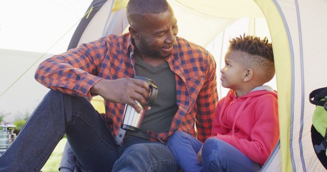 Father and Son Camping in Tent, Sharing Hot Drink - Download Free Stock Images Pikwizard.com