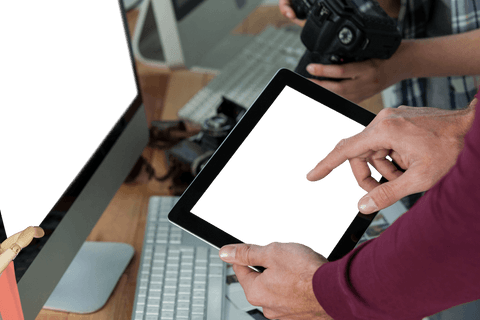Photographer Using Tablet with Transparent Screen Display - Download Free Stock Videos Pikwizard.com