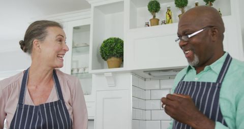 Senior Couple Cooking Together and Smiling in Modern Kitchen - Download Free Stock Images Pikwizard.com